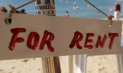 photo of a sign that says for rent